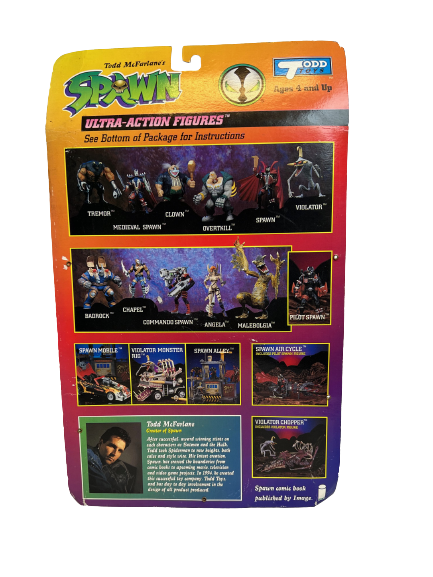 The back of a box containing an action figure. The box has a yellow to orange to red to purple gradient. The box says SPAWN Ultra-Action Figures and features a variety of action figures.